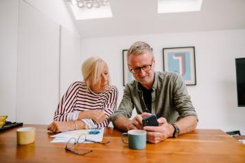 Older couple working out their pension credit